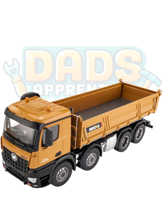 Toy dump truck with 'Dads Apprentice' text on a white background